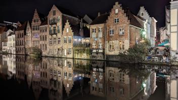 Ghent at night on water
